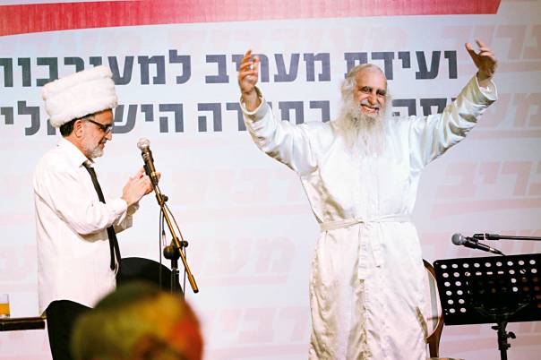 הרב מנחם פרומן ואהוד בנאי, כנס "מעורבים" באילת, 2013  צילום: אריק סולטן